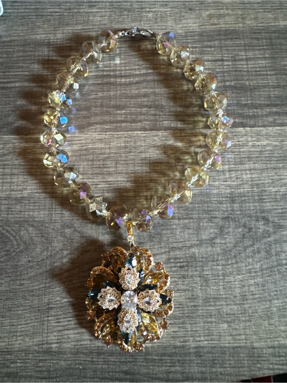 "Consigning Soon" Gold Floral Crystal Pendant Necklace with Iridescent Beads